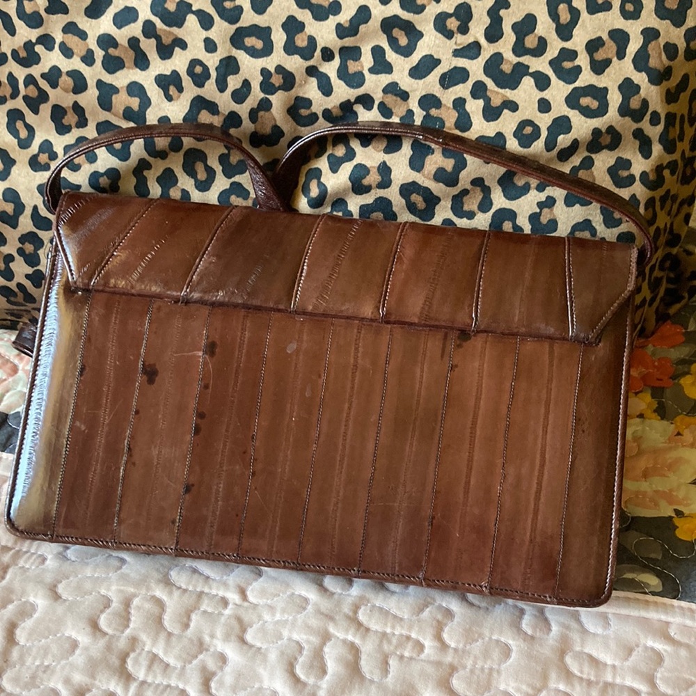 Eel skin bag, rich brown with brown suede interior. Excellent condition!
